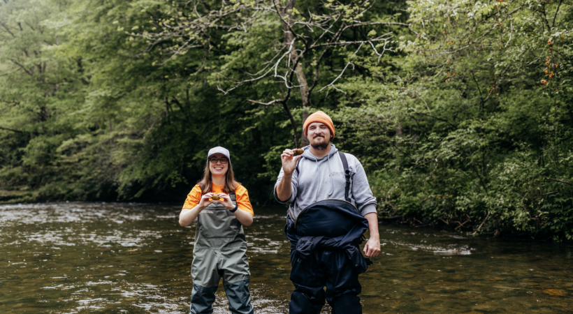 Two students at Abrams Creek identifying mussel species